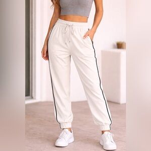 Express Cream Joggers with Black Stripe glitter.